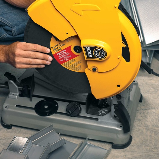 Chop Saw with QUIK-CHANGE™ Keyless Blade Change System being shown from  back